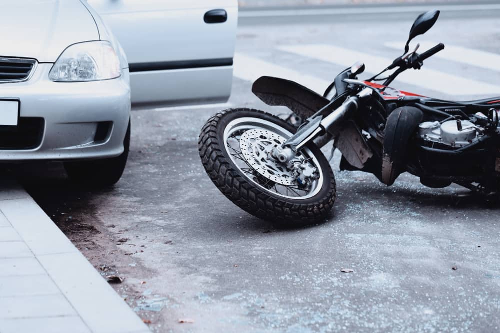 Boise motorcycle accident, motorcycle laying on its side on the ground